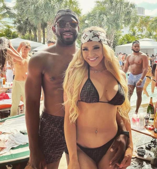 onlyFans model Courtney Clenney  and her slain boyfriend Christian Obumseli on a beach