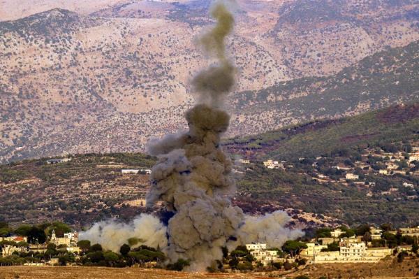 Smoke rising from the site of an Israeli airstrike in the village of Ibl al-Saqi in southern Lebanon on Sept. 30, 2024.