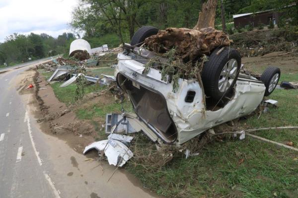 Destroyed car on Route 19E in Burnsville, N.C., swept away by floodwaters during Hurricane Helene in 2024