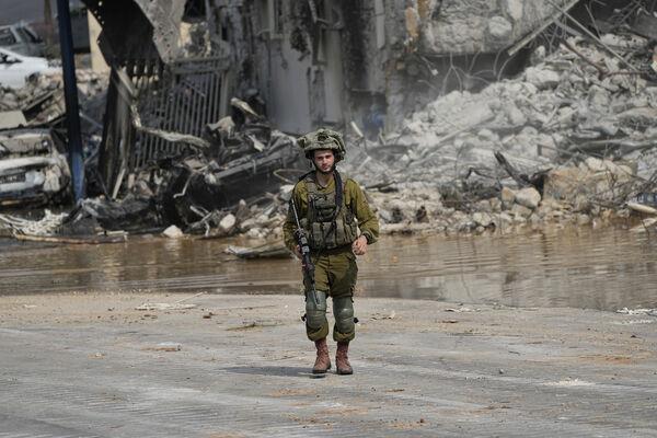 An Israeli soldier walks outside a police station that was overrun by Hamas militants on Saturday, in Sderot, Israel, Sunday, Oct.8, 2023. (AP Photo/Ohad Zwigenberg, File) An Israeli soldier walks outside a police station that was overrun by Hamas militants on Saturday, in Sderot, Israel, Sunday, Oct.8, 2023. (AP Photo/Ohad Zwigenberg, File)