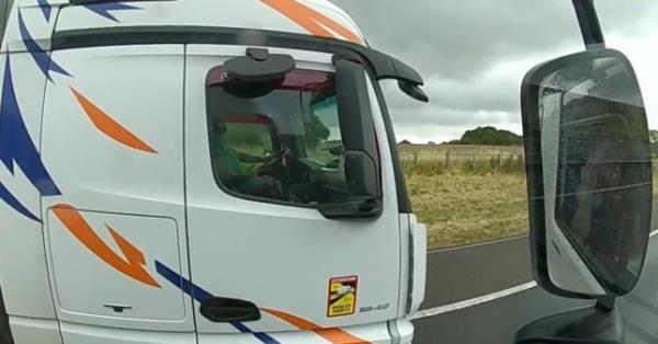 HGV driver was interacting with his mobile phone and not wearing seatbelt on the M40. Police using an unmarked HGV caught a driver using his mobile phone while steering with his KNEES. A lorry driver was also spotted with their feet up while on their phone. The reckless motorists were among 129 drivers caught driving illegally over a four-day period. Warwickshire Police were patrolling the M40, M42 and A46 in an undercover lorry between July 22-26 this year.