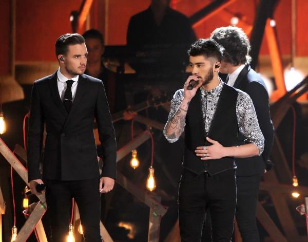 Liam Payne and Zayn Malik perform onstage during the 2013 American Music Awards in LA.