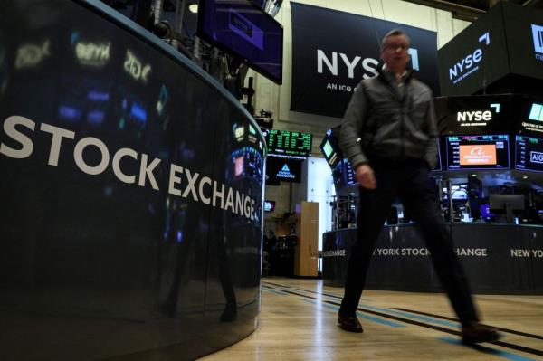 Wall Street climbs on signs of easing inflation; chip stocks gain