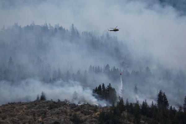 Evacuation order issued for western Canadian town as wildfire crosses over from US