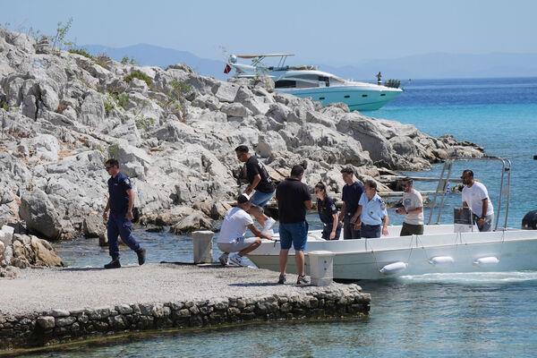 Emergency services on a boat at Agia Marina in Symi, Greece, where a body has been discovered during a search and rescue operation for TV doctor and columnist Michael Mosley, after he went missing while on holiday. Picture: Yui Mok/PA Wire