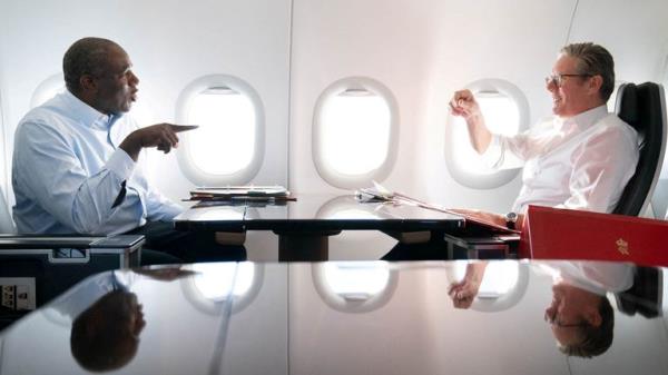 Prime Minister Sir Keir Starmer and Foreign Secretary David Lammy work on the plane as they fly to Washington DC, for talks with President Joe Biden on resolving the conflicts in Ukraine and Gaza.Picture date: Thursday September 12, 2024.