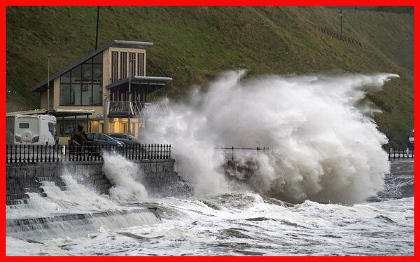 Waves crash over the promenade in Scarborough, as Storm Babet batters the UK. Picture: Danny Lawson/PA Wire Waves crash over the promenade in Scarborough, as Storm Babet batters the UK. Picture: Danny Lawson/PA Wire