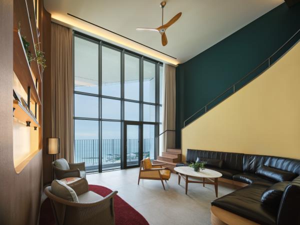 The living room area of a loft room offered at Village de Ananti's Ananti at Hotel (Village de Ananti)