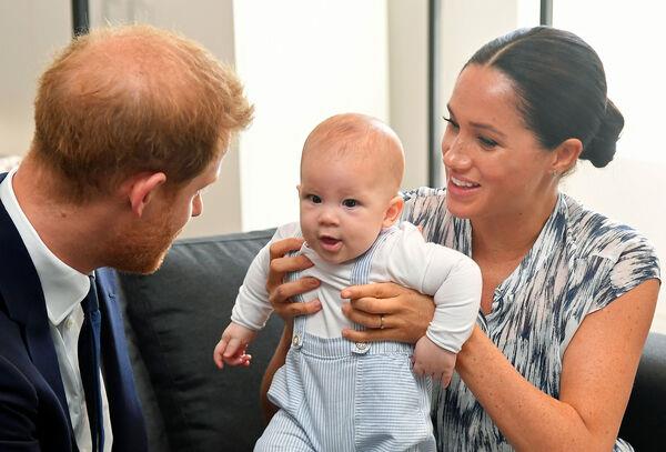 Britain's Prince Harry and Meghan Markle holding their son Archie during a meeting with Archbishop Desmond Tutu and Mrs Tutu at their legacy foundation in cape Town, on day three of their tour of Africa in 2021