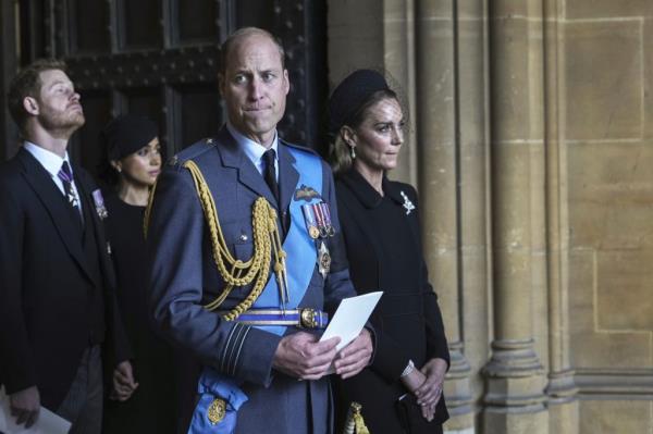 Prince William, Catherine, Prince Harry, and Meghan, Duchess of Sussex escorting the coffin of Queen Elizabeth II from Buckingham Palace to Westminster Hall.