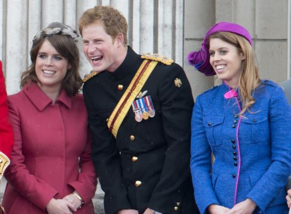 Prince Harry, Princess Beatrice, and Princess Eugenie posing together at the Trooping the Colour event in London