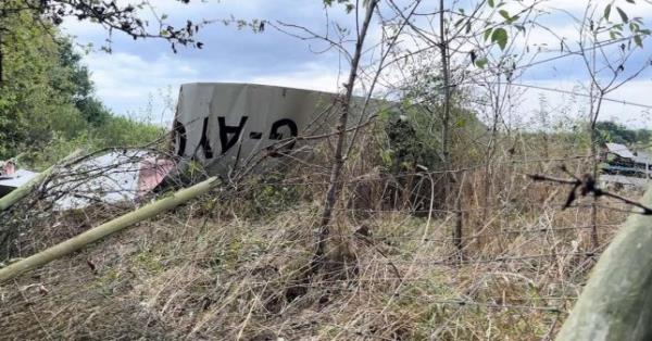 A plane crashed in a field.