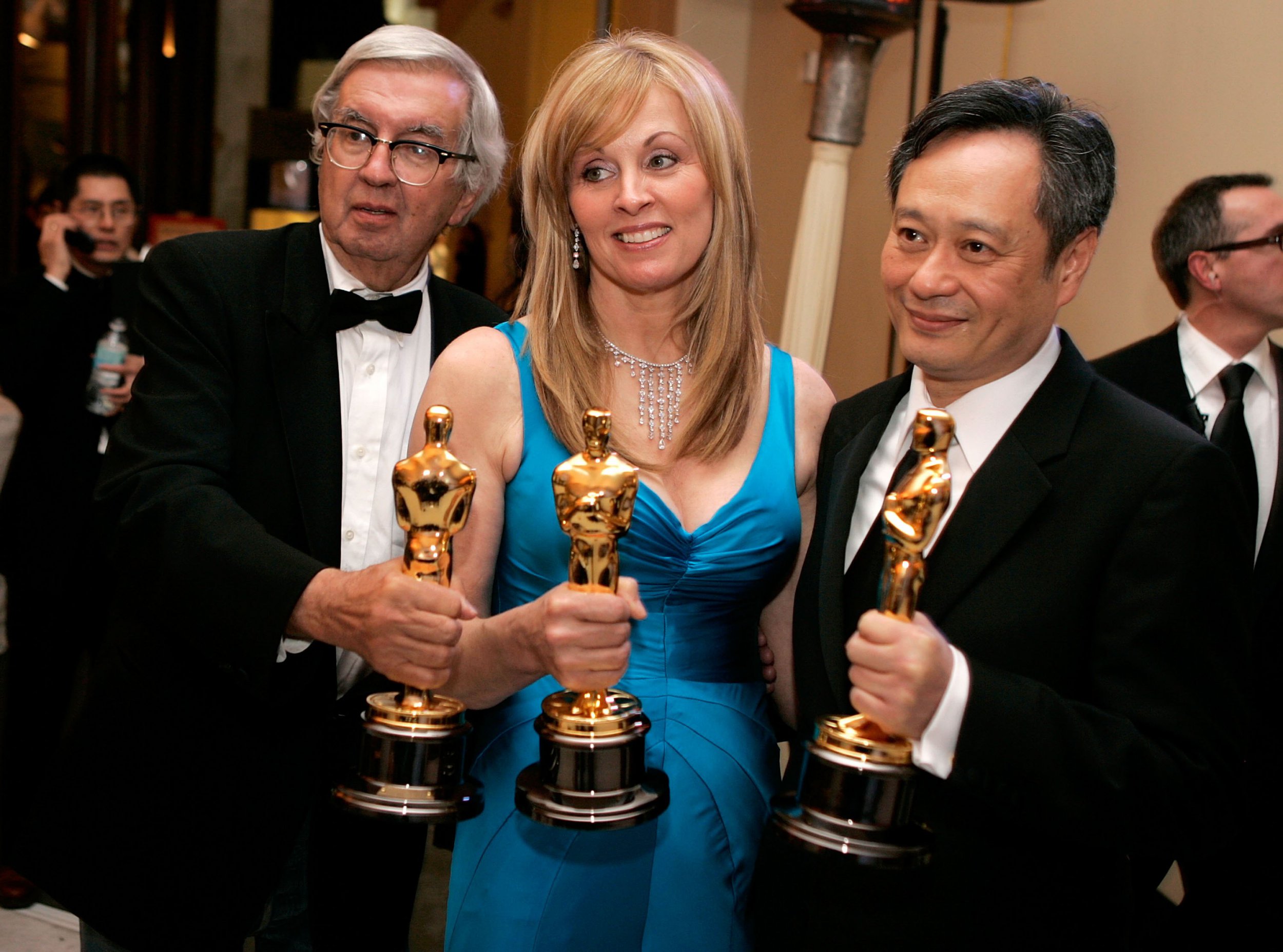 Writer Larry McMurtry, writer/producer Diana Ossana and director Ang Lee of Brokeback Mountain pose with their Oscars