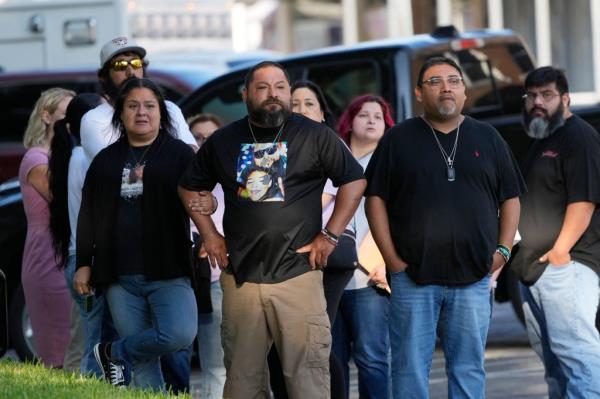 Families of the victims in the Uvalde elementary school shooting file out of the Uvalde County Courthouse where former Uvalde Consolidated Independent School District police officer Adrian Gonzales appeared to face charges of abandoning and failing to protect children, Thursday, July 25, 2024, in Uvalde, Texas