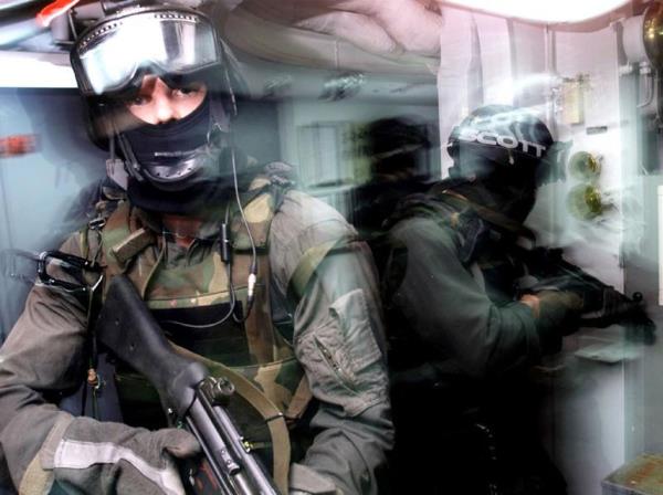 US Navy Seals conduct Room Search and Clearing Operations during practice in July 2000.