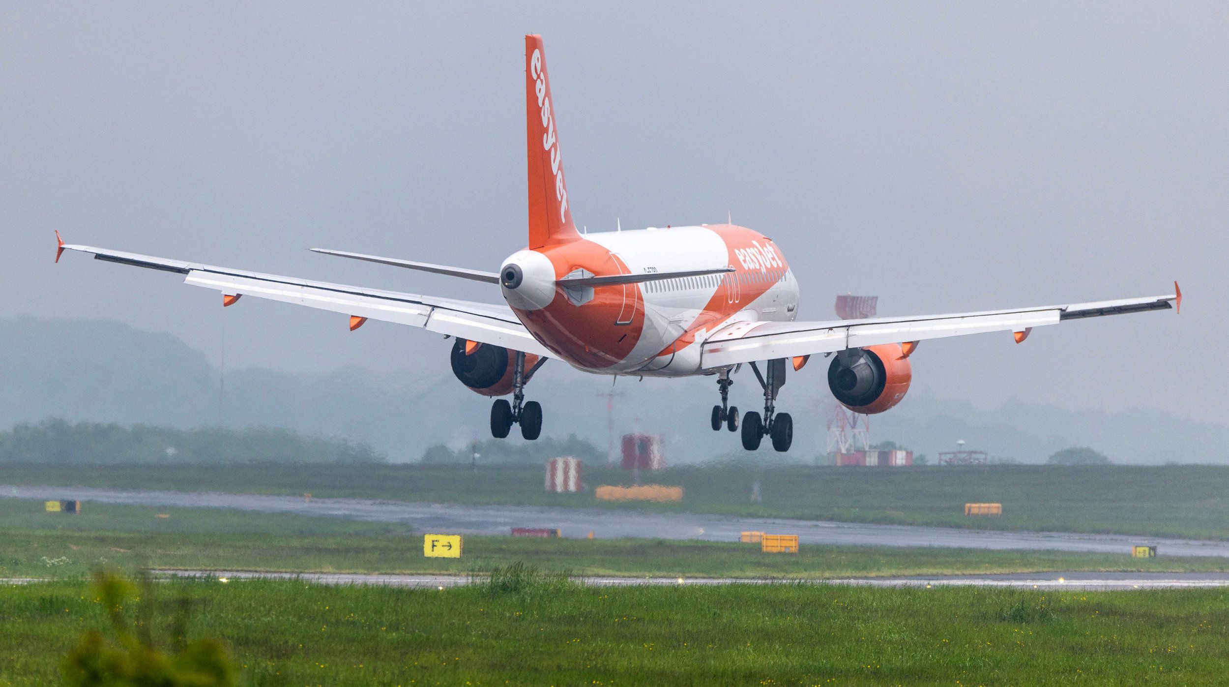 Mandatory Credit: Photo by Andrew McCaren/LNP/REX/Shutterstock (14480127f) A Easyjet aircraft has a bumpy landing in the strong winds this morning at Leeds Bradford airport in Yorkshire. Leeds Weather, Leeds, Yorkshire, UK - 14 May 2024