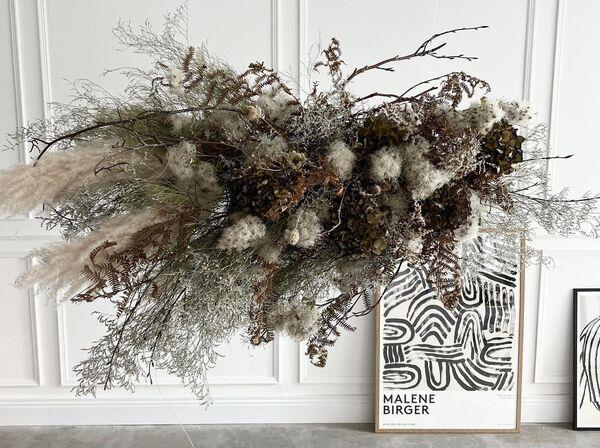  Laura Beasley's suspended foliage installations can be hung over a table or feature in a room corner.