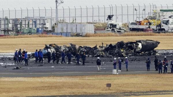 Japanese officials begin on-site inquiries after fatal crash at Tokyo airport
