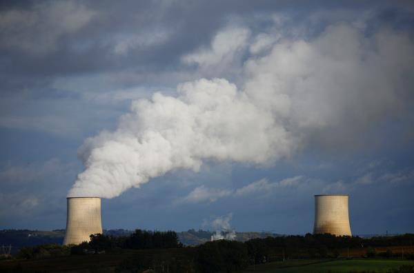 Steam rises from a cooling tower of the Electricite de France (EDF) nuclear power plant in Golfech