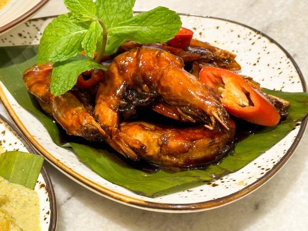 Tamarind Prawn has fresh prawns coated in a sticky sauce that is not too sour — Picture by Lee Khang Yi