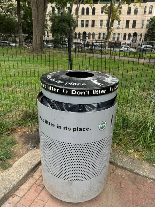 Standard NYC trash can show here located in Saratoga Park, Brooklyn for story on the new trash cans