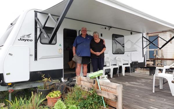 Their home may be destroyed, but the makeshift vege garden is thriving.