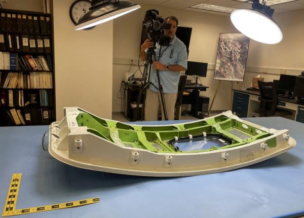 The door plug is made available for news media crews before the National Transportation Safety Board hearings on the flight on July 30, 2024.