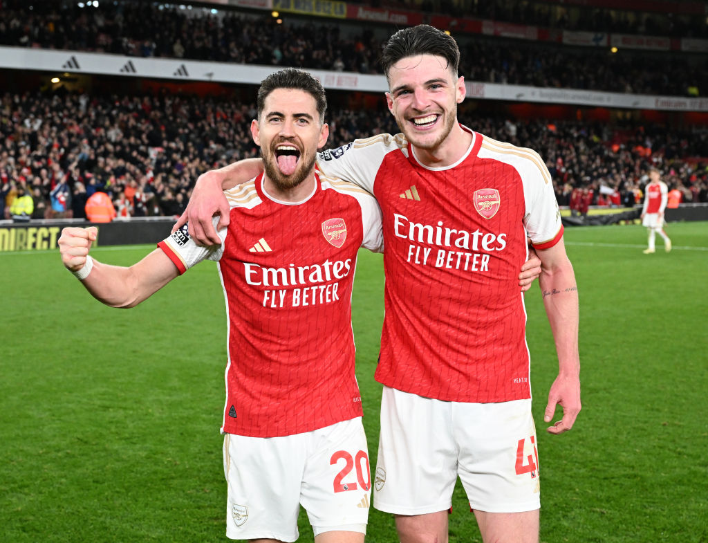 Jorginho and Declan Rice celebrate Arsenal's victory after the Premier League match between Arsenal FC and Liverpool FC