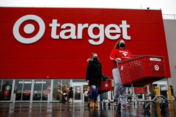 Shoppers exit a Target store during Black Friday sales in Brooklyn, New York, U.S., November 26, 2021. REUTERS/Brendan McDermid