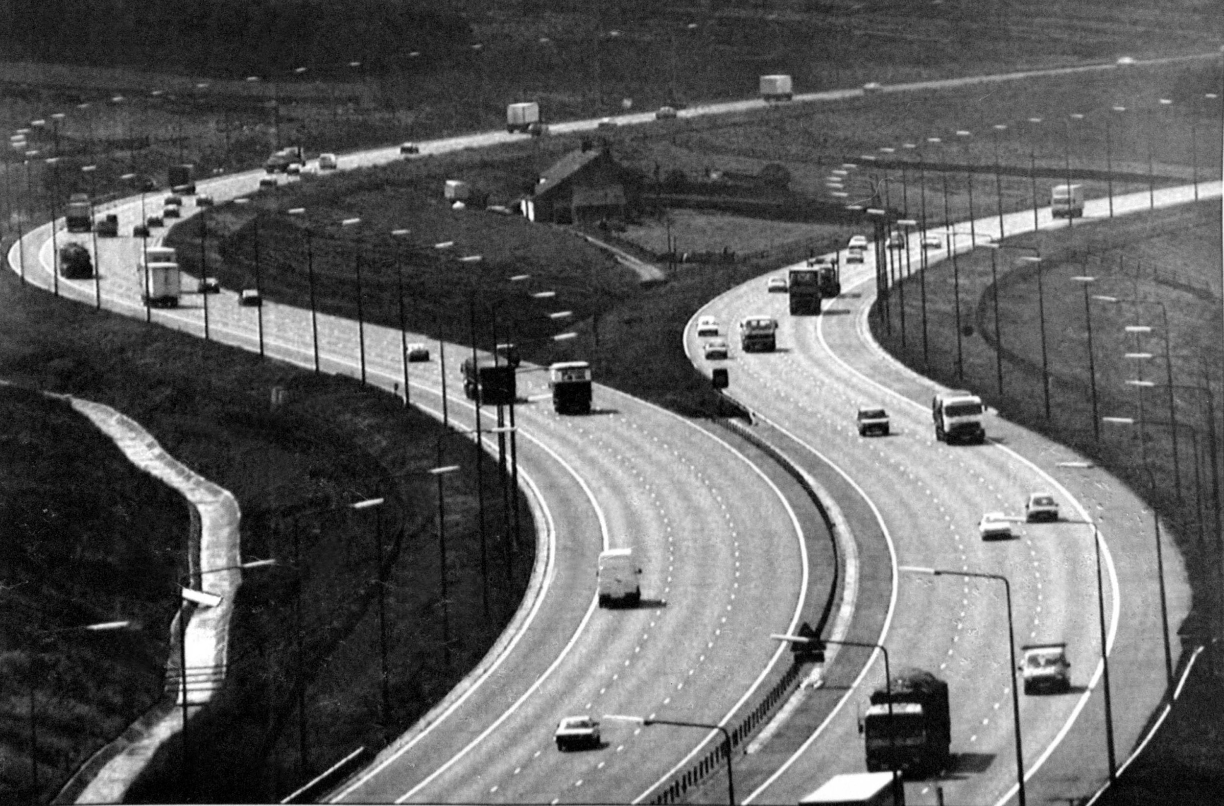 The 18th century farmhouse, which stands on an island in the middle of the M62 motorway. The Dept. of Transport plans to widen the road which will mean that shepherd Ken Wild will lose a further 15ft from the 100ft piece of land.
