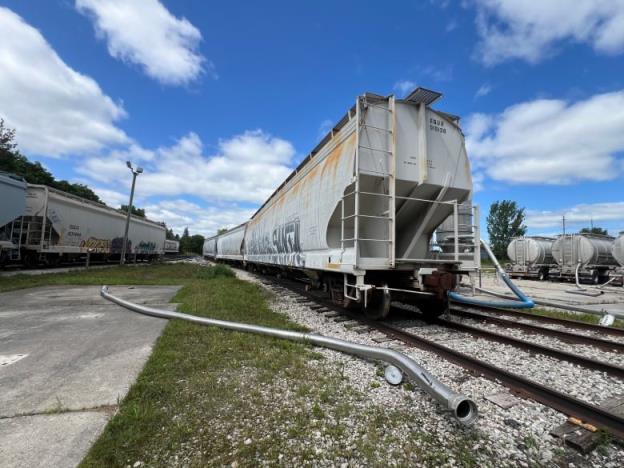 Railcars sit in the siding at NexGen Polymers in London, Ont. The company typically takes delivery of 20 railcars a week loaded with plastic pellets for production of packaging and other goods.