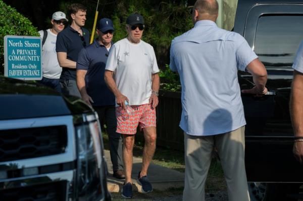 President Joe Biden walking from the beach towards his vehicle in Rehoboth Beach, Delaware
