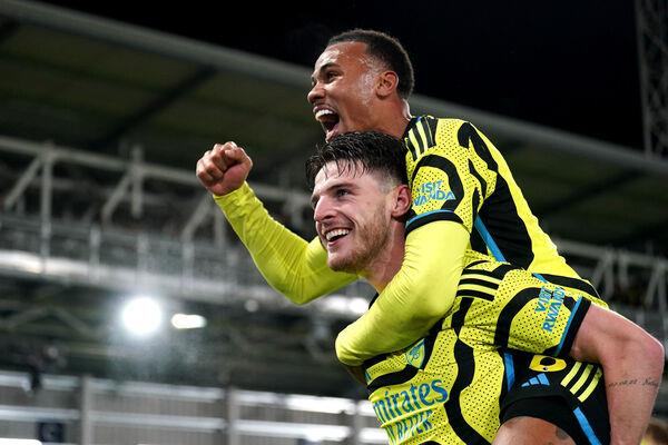 ELATION: Arsenal's Declan Rice (bottom) and Gabriel celebrate victory. Pic: Joe Giddens/PA Wire ELATION: Arsenal's Declan Rice (bottom) and Gabriel celebrate victory. Pic: Joe Giddens/PA Wire