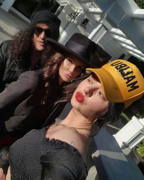 Slash with Lucy and her mom, Meegan Hodges.