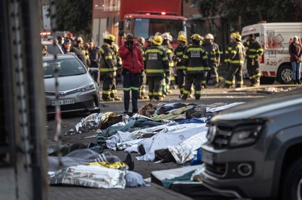 Fire engulfs illegal Johannesburg housing block killing 74