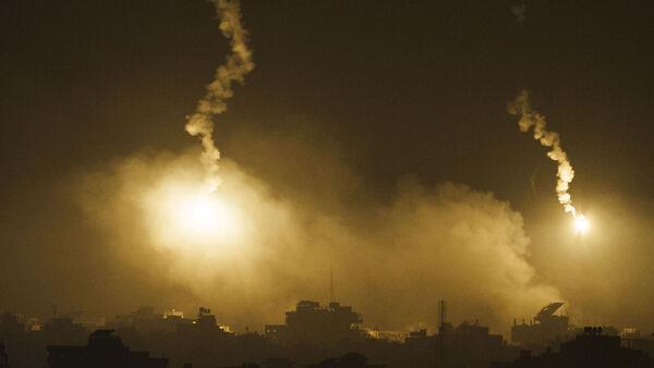 Iran warns expansion of Gaza war 'inevitable'; officials say air strikes hit hospitals