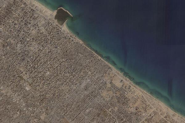 This satellite image from Planet Labs PBC shows Gaza City in the Gaza Strip on Monday, Nov. 6, 2023. Israeli troops have pushed into the Gaza Strip's largest city along a key coastal road on the Mediterranean Sea as part of their war on Hamas, satellite images from earlier this week analyzed Thursday, Nov. 9, 2023, by The Associated Press show. (Planet Labs PBC via AP)