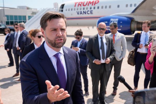 Republican vice presidential nominee Sen. JD Vance speaking to reporters near Air Force Two at Chippewa Valley Regional Airport, 2024