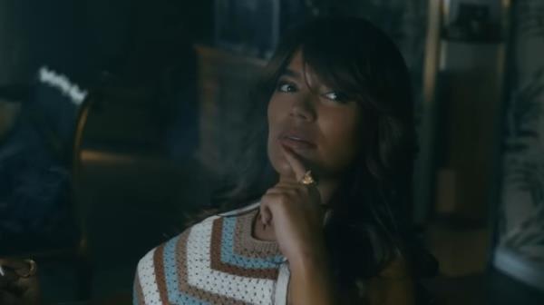 Karol G as Carla
