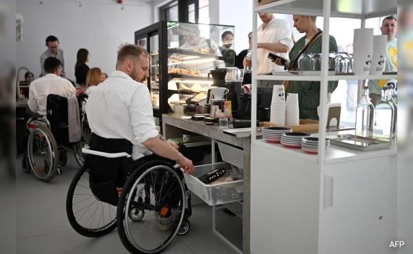 This Belarusian Wheelchair Barista Claims To 'Make The World Better'