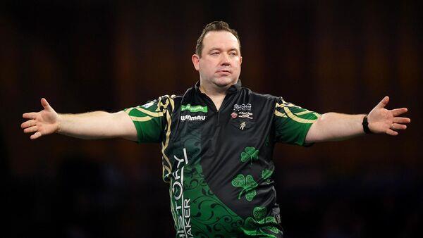 Victorious Dolan marches into Ally Pally quarter-final to meet teen sensation Littler