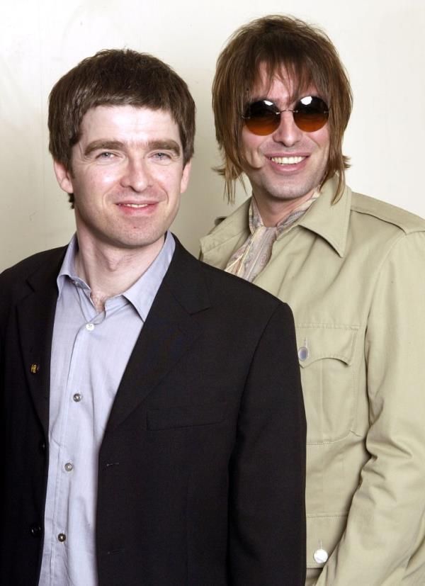 Noel (Left) and Liam (Right) Gallagher of Oasis attend the charity concert in aid of the "Teenage Cancer Trust" at the Royal Albert Hall on March 26, 2003 in London.