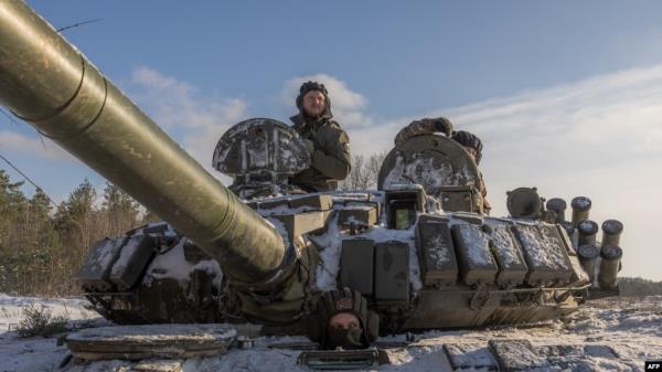 FILE - A Ukrainian tank crew takes part in a training exercise that focuses on fighting sabotage groups, in the Chernihiv region, Dec. 5, 2023, during the Russian invasion of Ukraine.