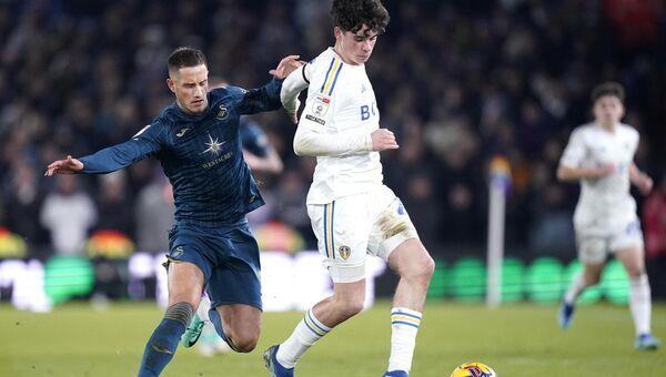 17 year old Archie Gray battles for the ball.