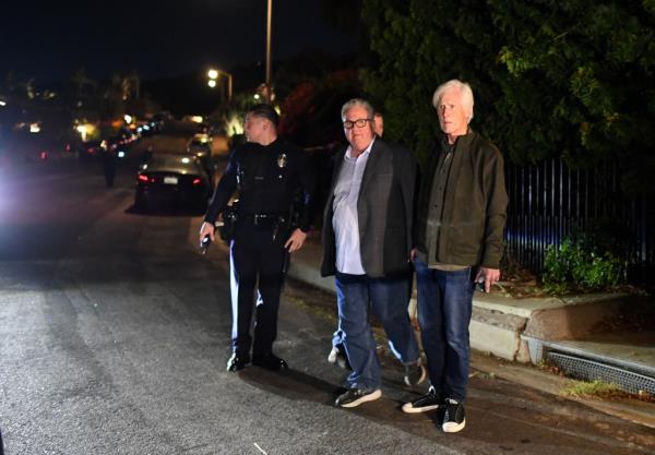 Keith Morrison and others outside Matthew Perry's home on Oct. 28.