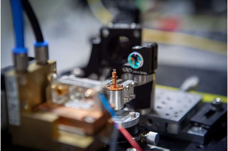 Highly sensitive quantum sensors for medicine: First successful demonstration of a dual-media NV diamond laser system