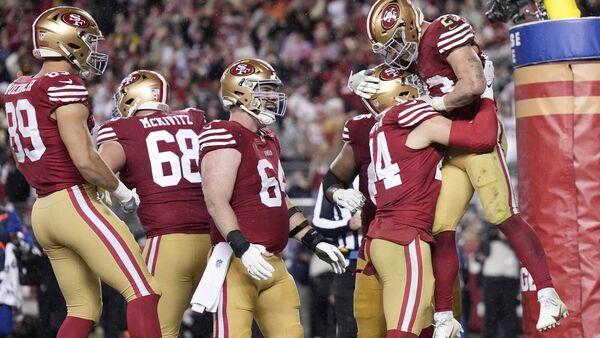 McCaffrey’s late touchdown powers 49ers past Packers into NFC title game
