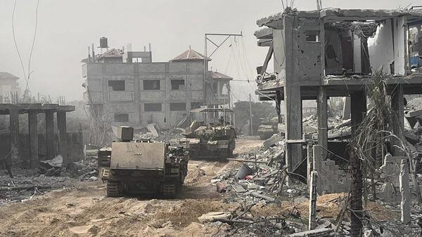 Efforts to pause fighting gain steam as Israeli troops push towards Gaza City