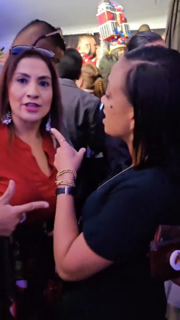 Morales and Singh arguing with each other