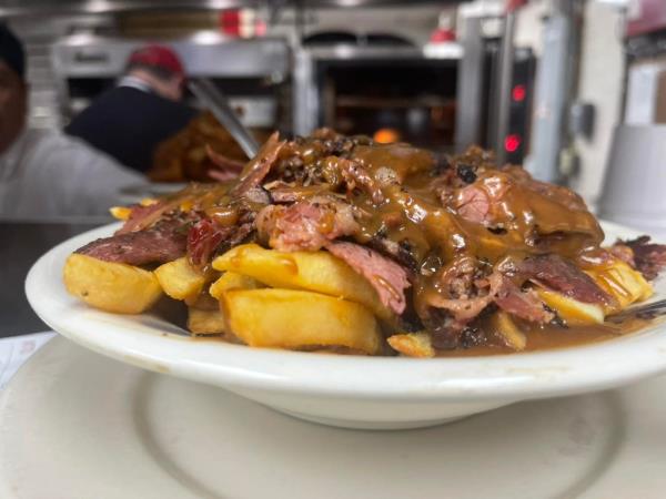Plucked Philly Fanatic Poutine -- french fries topped with pastrami and cheddar cheese curds